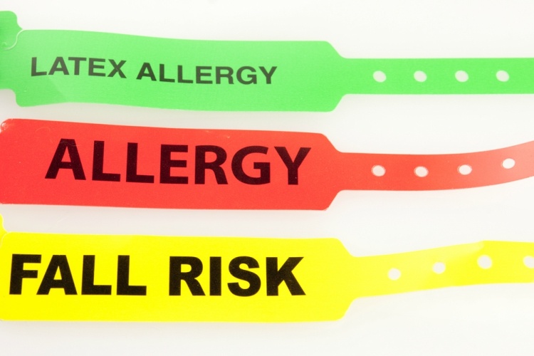 Green, red and yellow hospital wristbands for different allergies and concerns