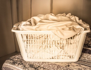 Basket of dirty sheets.