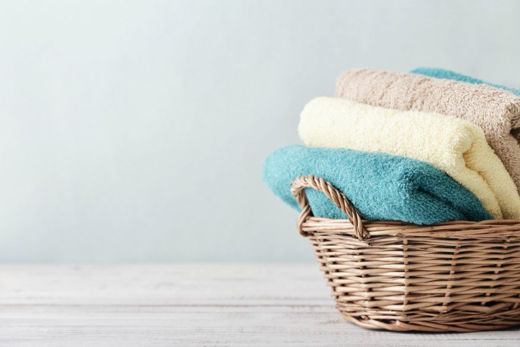 Basket of decorative bath towels.