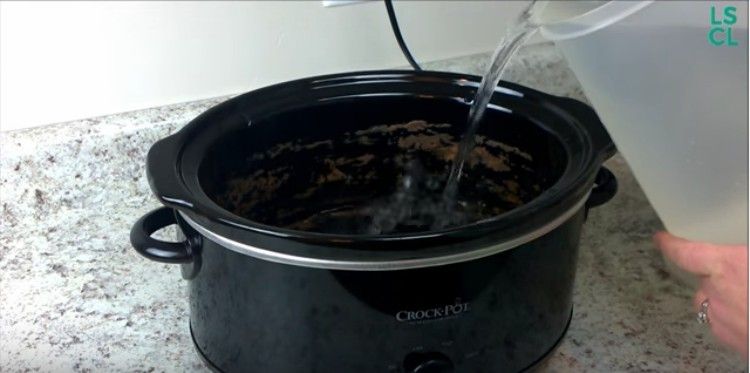 do you put water in a slow cooker