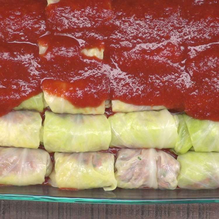 Pour remaining sauce, evenly, over the top of the cabbage rolls