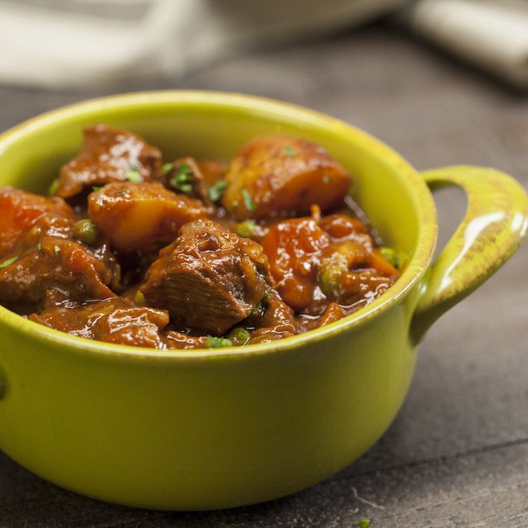 guinness beef stew in green pot