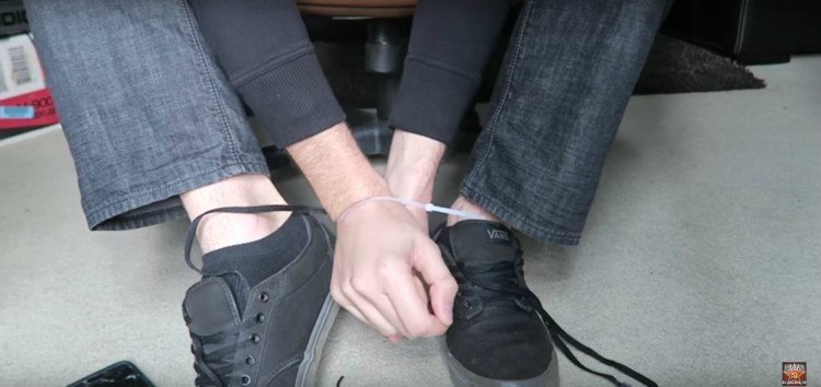 Image of shoelaces and zip tie escape.