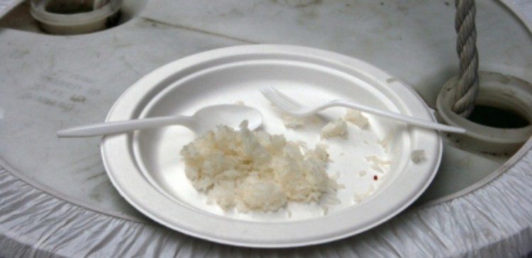 leftover rice on a plate with fork and knife