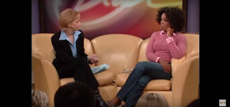 Image of Oprah speaking to doc.