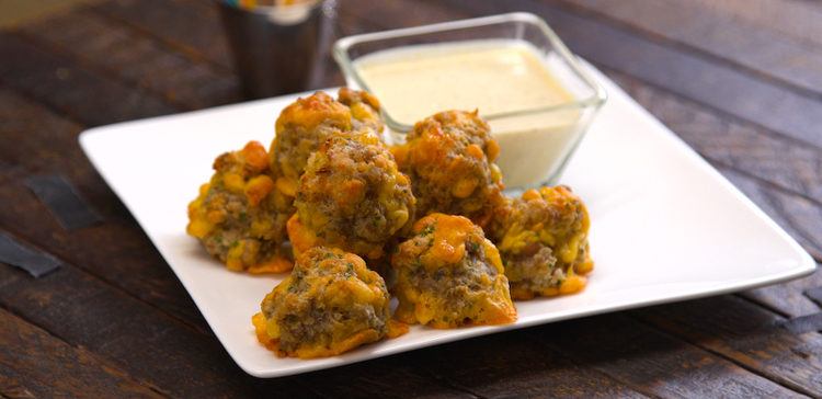 Our crowd-pleasing sausage balls recipe makes the easiest, tastiest, most addictive little party bites -- with just four ingredients.