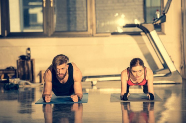 man and woman plank