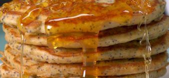 Fluffy buttermilk pancakes zing with bright lemony flavor from real lemon zest and juice, and plenty of poppy seeds add a subtle crunch.
