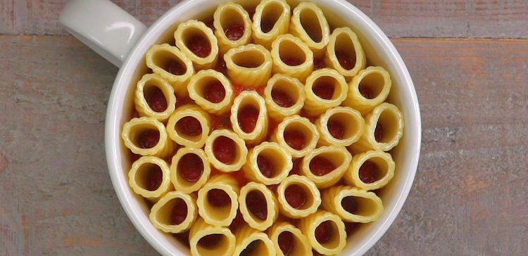 You can make these eye-catching mini rigatoni pasta pies in a coffee mug. Just rigatoni pasta, melted mozzarella cheese, marinara sauce, and fresh basil.