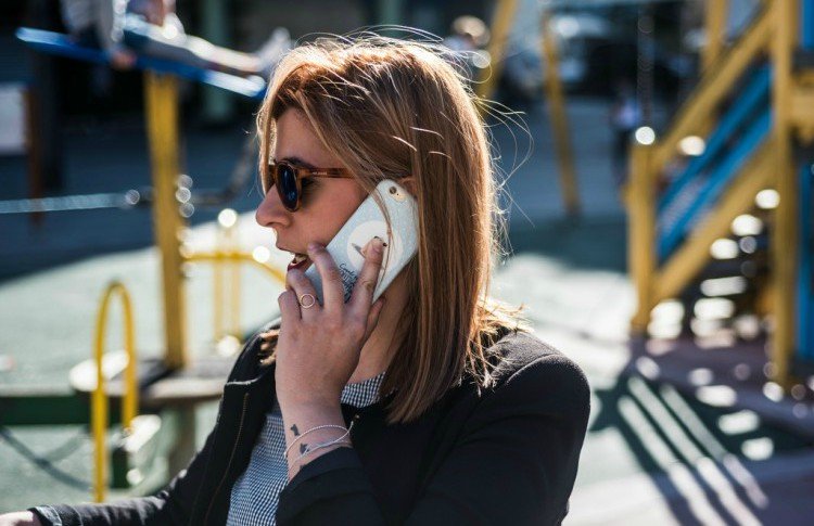 Image of woman on phone.