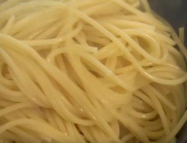 cooked noodles in saute pan