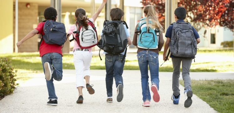 Image of students with backpacks.