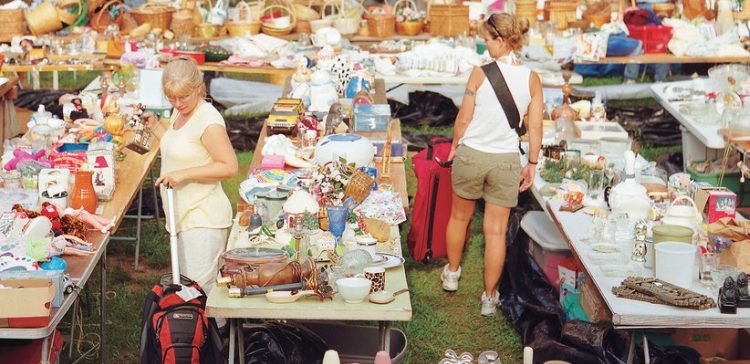 Image of people shopping at a garage sale.