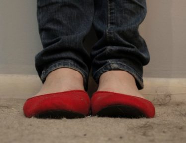 A pair of feet in socks