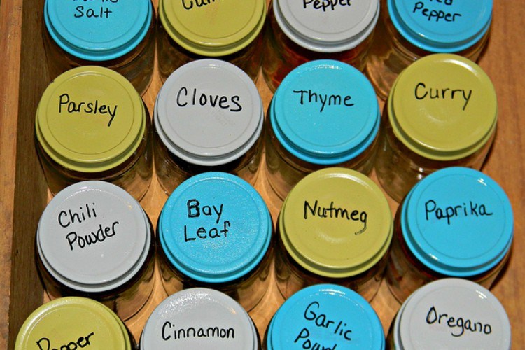 Image of spice jars in drawer.