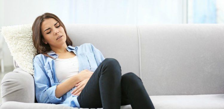 Image of woman with cramps.