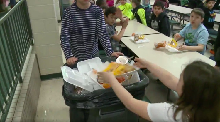 Image of kids throwing out food
