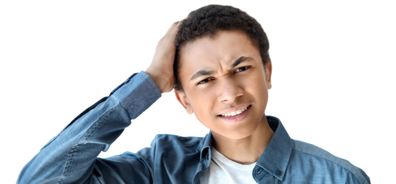 Image of a boy looking confused