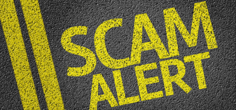 Image of scam alert sign