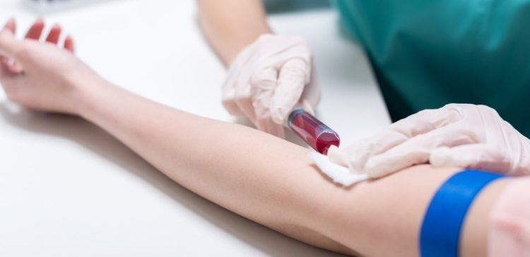 Image of person getting blood test.