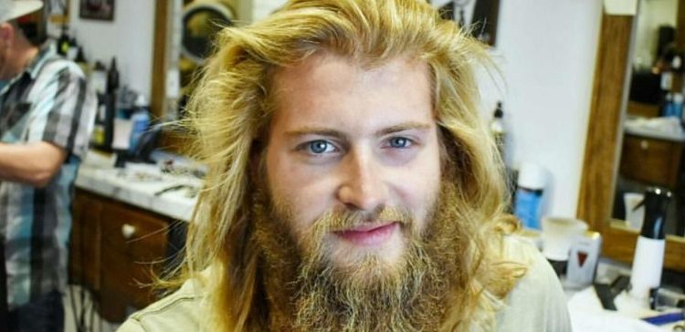Image of man with shaggy blonde hair and beard