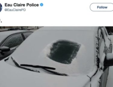 Image of snow-covered car
