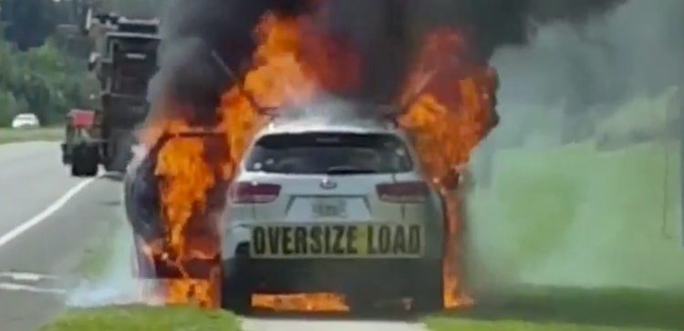 Image of Kia vehicle on fire.
