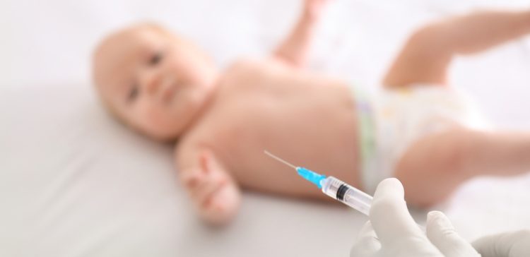Image of baby about to be vaccinated
