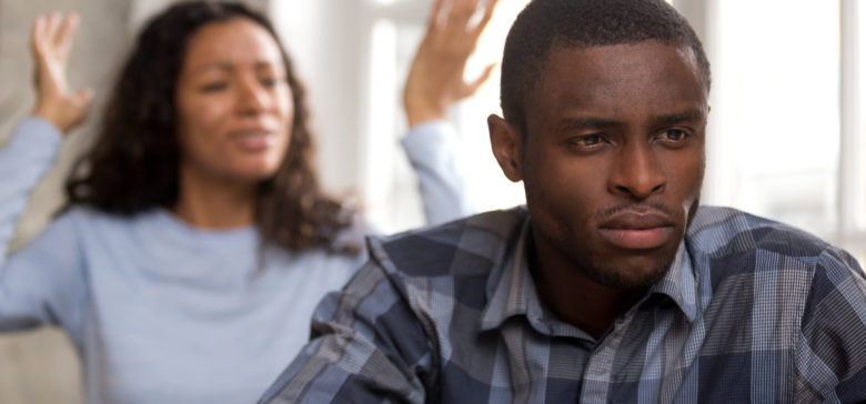 Image of upset african husband feels disappointed in love ignoring angry