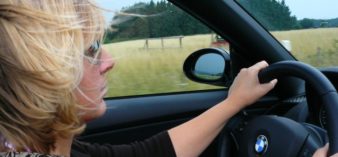 Image of a woman driving a car